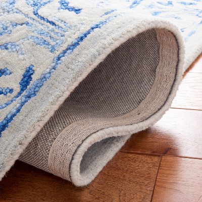 Hand-Tufted Blue and Beige Wool 4' x 6' Area Rug