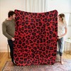 Ultra-Soft Red Leopard Print Flannel Throw Blanket - Cozy, Lightweight & Warm for Couch, Bed, Office, and Travel - All-Season Comfort. - 2 of 4