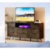 Spacious 8-Drawer Black Dresser with App-Controlled LED Lights & Built-in Charging Station – Ideal for Any Room - 2 of 4