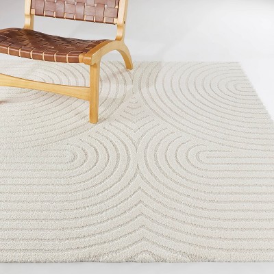 Cream Synthetic 5' x 7' Reversible Rectangular Rug
