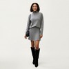 Anna-Kaci Women’s Knit Turtleneck Sweater and Pleated Skirt Set with Ribbed Texture High Neck Top and Stretch Waist Flared Hem Skirt - 3 of 4