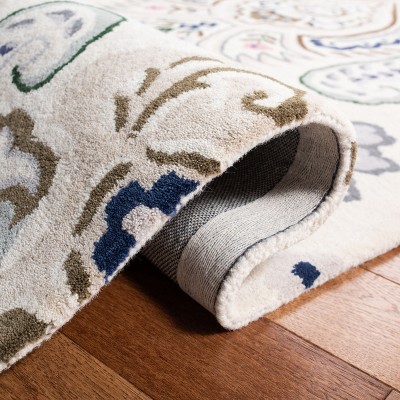 Ivory and Blue Hand-Tufted Wool 9' x 12' Area Rug