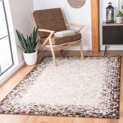 Handmade Beige and Brown Geometric Cowhide Area Rug
