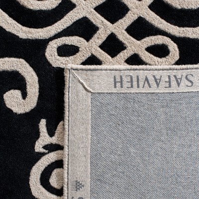 Handmade Black and Ivory Wool Viscose Tufted Area Rug