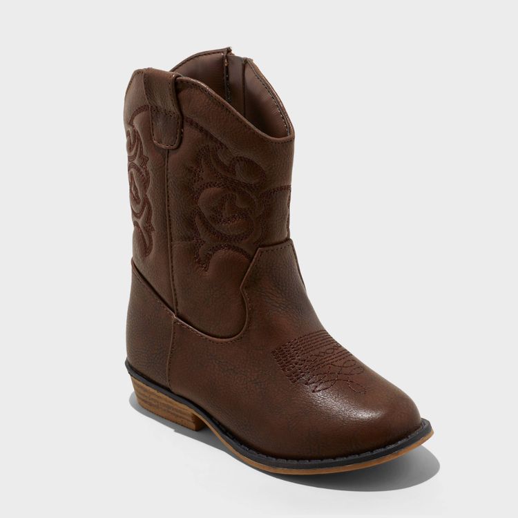 Brown colored cowboy boot with decorative stitching and a low heel.