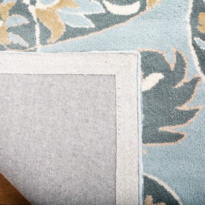 Wyndham Blue and Multicolor Hand-Tufted Wool Area Rug 5' x 8'