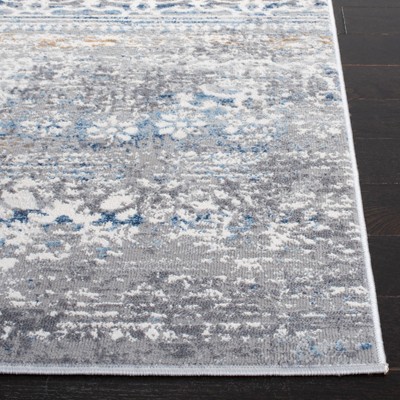Ivory and Blue Reversible Flat Woven 8' x 10' Synthetic Rug