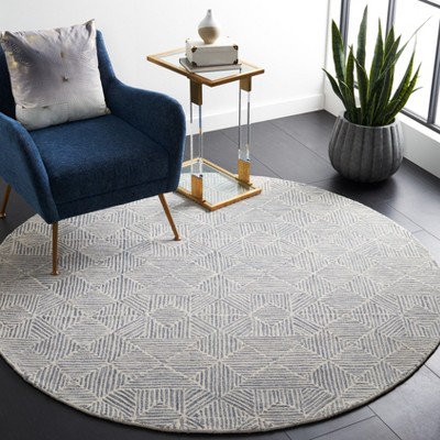 Grey and Ivory Round Tufted Wool Area Rug, 6' x 6'