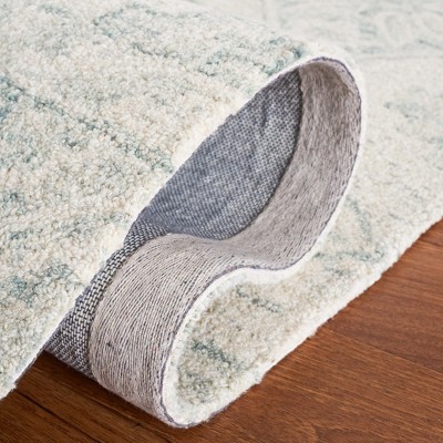 Handmade Light Blue Wool and Synthetic Tufted Rug
