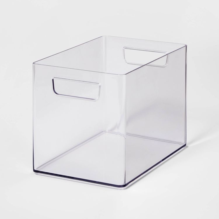 Clear rectangular bathroom organizer bin with handles, featuring a simple design.