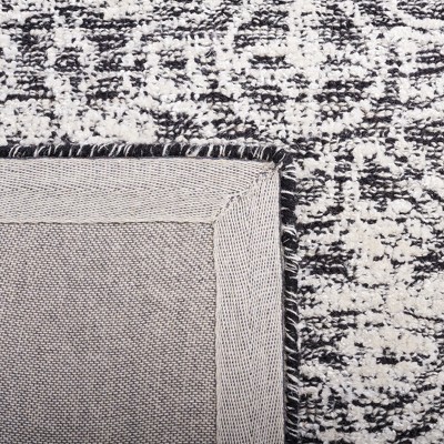 Black and Ivory Geometric Wool 3' x 5' Area Rug