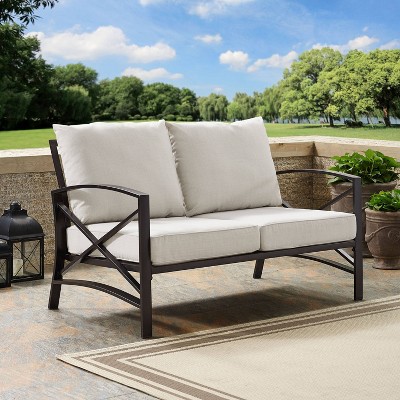 Oatmeal and Bronze Metal Outdoor Loveseat with Cushions
