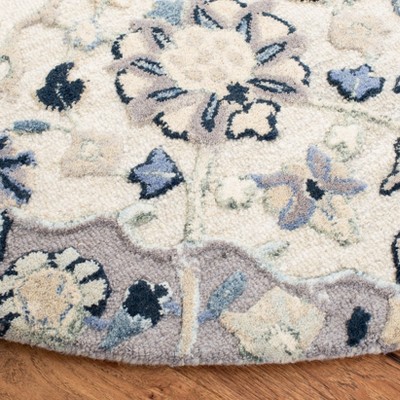 Elegant Charmaine Blue Wool 6' Round Hand-Tufted Area Rug
