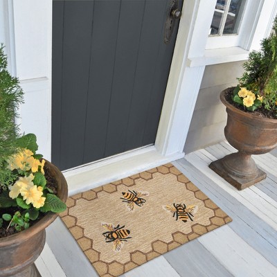 Handmade Round Black and Beige Synthetic Tufted Rug