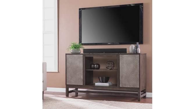 Tifchar Storage TV Stand for TVs up to Brown/Antique Silver - Aiden Lane, 2 of 13, play video
