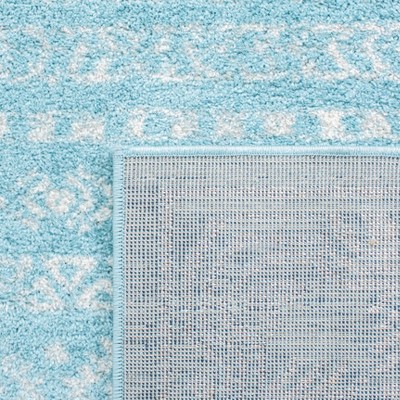 Aqua and Ivory Round Hand-Knotted Synthetic Rug