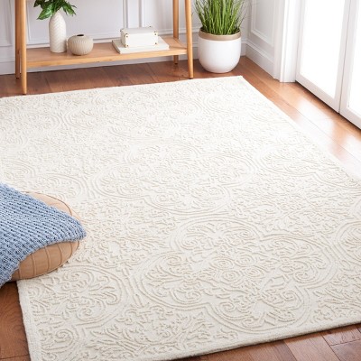 Ivory Hand-Tufted Wool and Synthetic 4' x 6' Area Rug