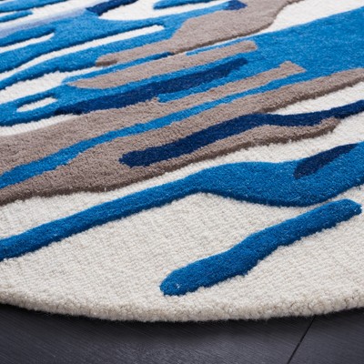 Ivory and Blue Round Hand-Tufted Wool Area Rug
