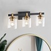 Dewdrop 3-Light Bathroom Vanity Light, Modern Black and Gold Wall Sconce with Ribbed Clear Glass Shades - 2 of 4