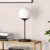 Hudson and Canal 21" Tall Globe and Stem Table Lamp with Round Glass Shade - 3 of 4