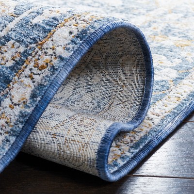 Ivory and Blue Rectangular Oriental Synthetic Area Rug 8' x 10'