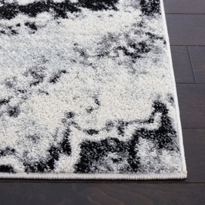 Ivory Boho-Chic Hand-Knotted Synthetic Area Rug