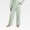 Kids' Gingerbread Striped Long Sleeve Shirt and Pants Holiday Matching Family Pajama Set - Wondershop™ Cream - 4 of 4