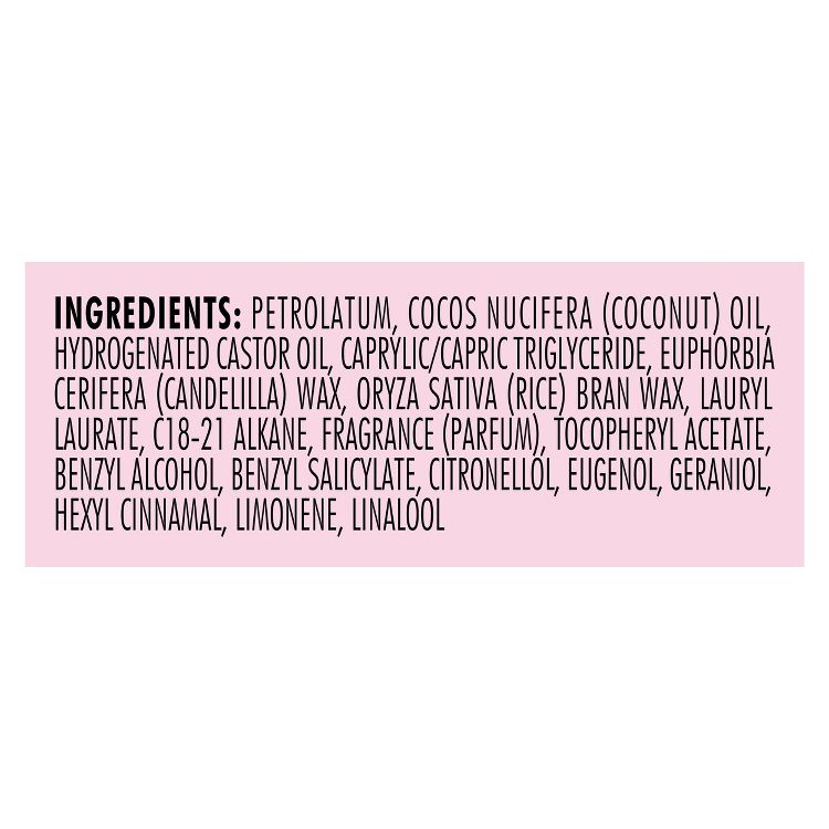 A list of ingredients on a pink background including petrolatum, coconut oil, and fragrance.