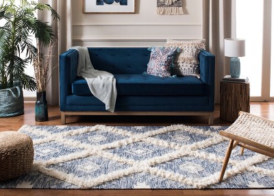 Ivory and Blue Hand-Knotted Wool 6' x 9' Area Rug