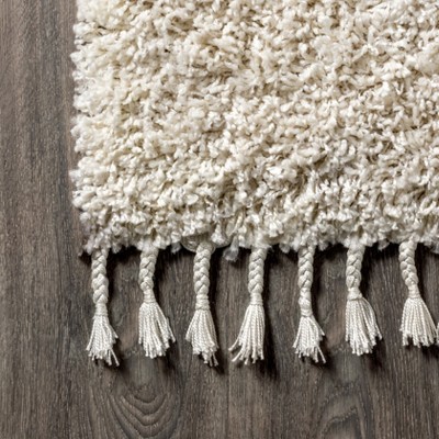 Cream 8' x 10' Reversible Shag Area Rug with Tassels