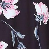 large pink flower on black background