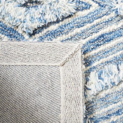Ivory and Blue Hand-Knotted Wool 6' x 9' Area Rug