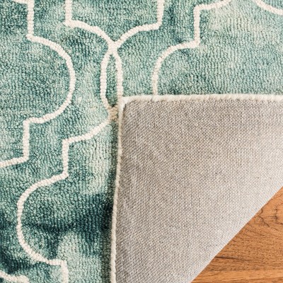 Lush Green and Ivory 4' x 6' Hand-Tufted Wool Area Rug