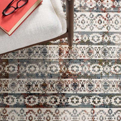 Elegant Ivory Oriental 4' x 6' Synthetic Area Rug