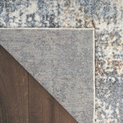 Ivory Abstract Synthetic 3'3" x 5' Easy-Care Area Rug