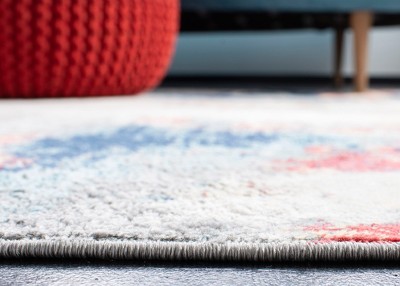 Jasper 8' x 10' Grey and Red Abstract Synthetic Rug