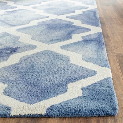 Ivory and Blue Hand-Tufted Wool 6' x 9' Area Rug