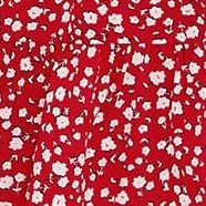 small white flowers on red background