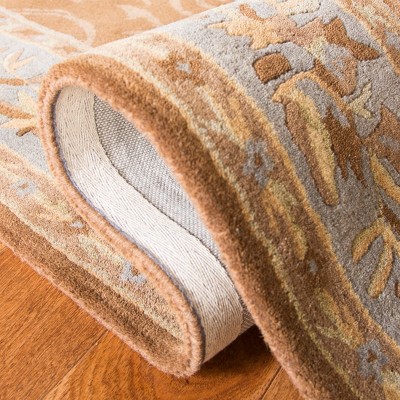 Empire Blue and Brown Hand-Tufted Wool 6' x 9' Area Rug