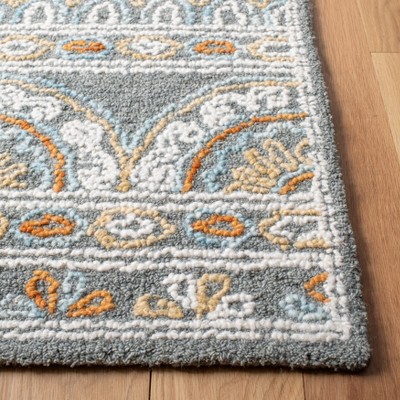 Ivory Floral Tufted Wool Rectangular Area Rug, 6' x 9'