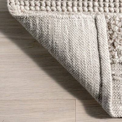 Cream Textured Synthetic 4' x 6' Rectangular Area Rug