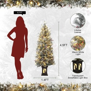 4.5ft Pre-Lit Snow Flocked Christmas Tree with 200 LED Lights, Artificial Potted Xmas Tree with 8 Lighting Modes, Faux Berries,Snowman Base - 1 of 4