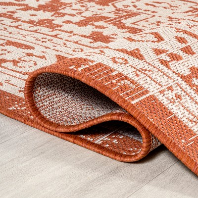 Sinjuri 4' x 6' Orange/Cream Synthetic Medallion Rug