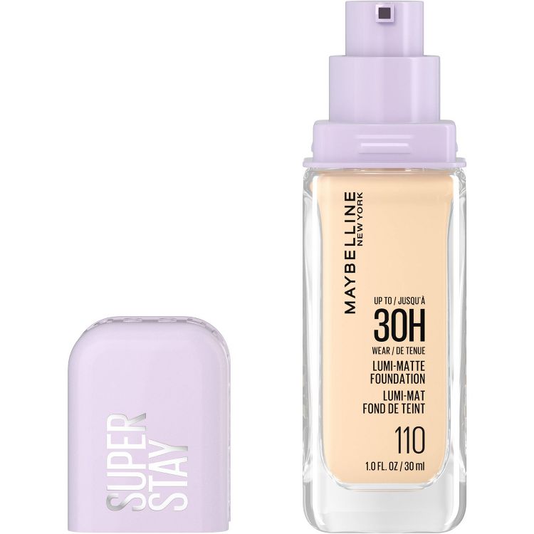 Clear bottle of Maybelline Super Stay 30H Lumi-Matte Liquid Foundation with a purple pump and cap, labeled shade 110, 1 fl oz.