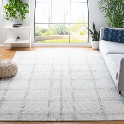 Ivory and Gold 8' x 10' Handmade Wool Abstract Rug