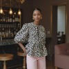 Knit & Lounge Women’s Animal Print Puff Sleeve Peplum Blouse Tie Front Split Neckline Adjustable Waist Feminine Statement Top - 2 of 4