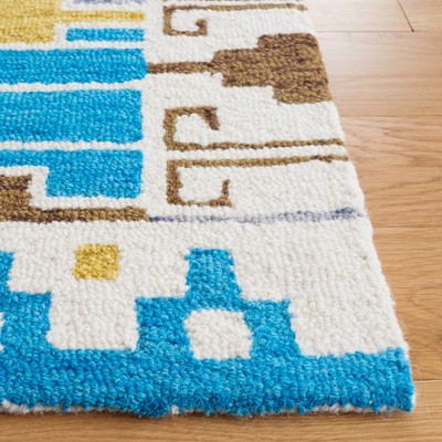Blue and Ivory Hand-Tufted Wool Area Rug