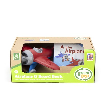 green toys airplane and board book