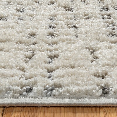 Ivory and Gray Tufted Polka Dot 5' x 7' Synthetic Rug