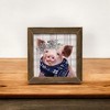 Slickblue Yuletide Scrapple Pig Print with Flower Crown and Winter Scarf – Gray Plaid Background, Natural Wood Frame - 2 of 3